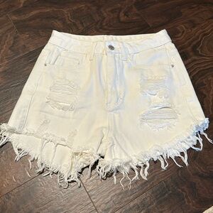 Cutoff distressed denim shorts